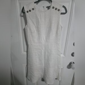 Classic White Sleeveless Sheath Dress with Button Accents